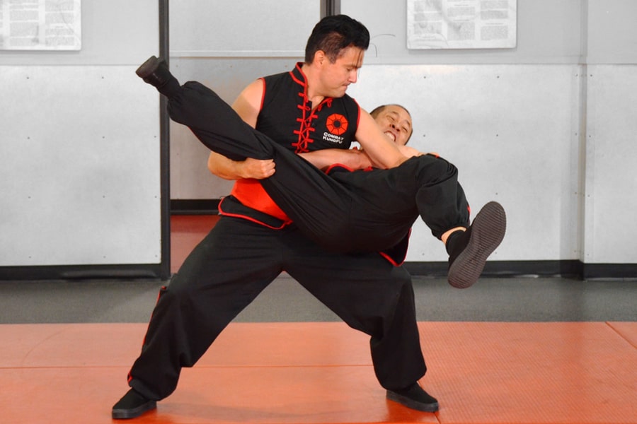 Image of Donald Tittle, a Combat Kung-Fu Instructor & 6th Generation Choy Li Fut Master, Applying a Take-Down Technique